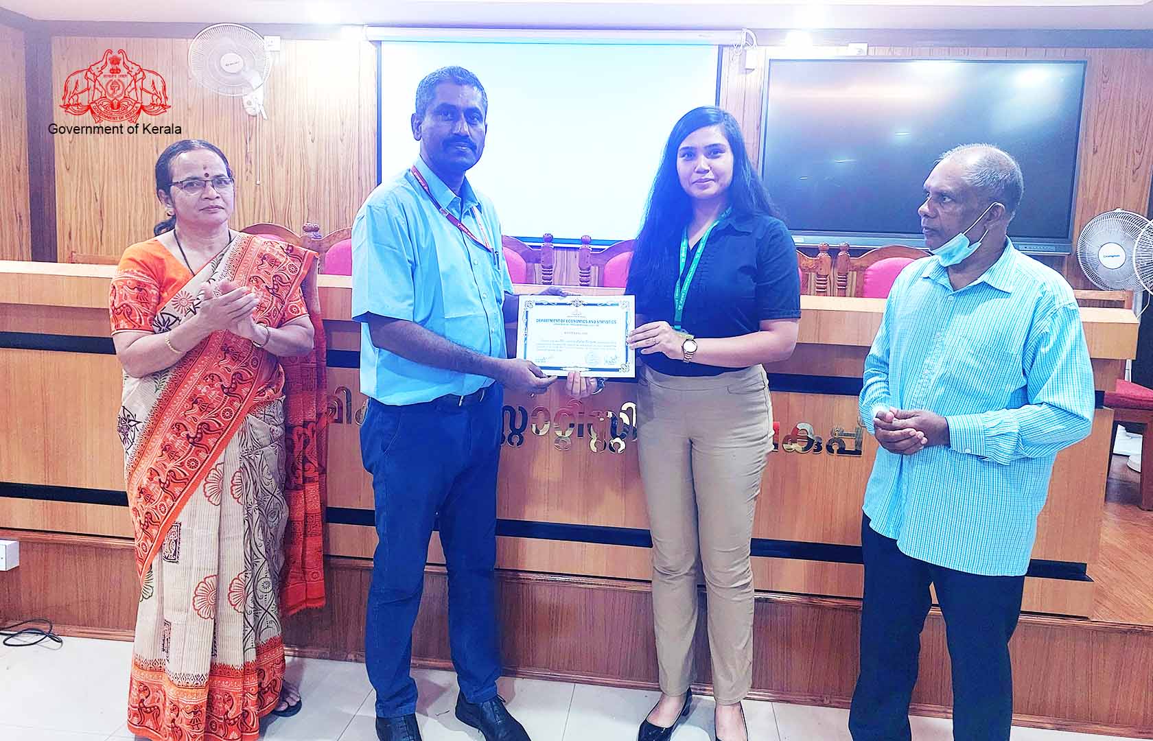 Distribution of certificate to Smt. Ayesha Zuhee Nizam, ISS probationer