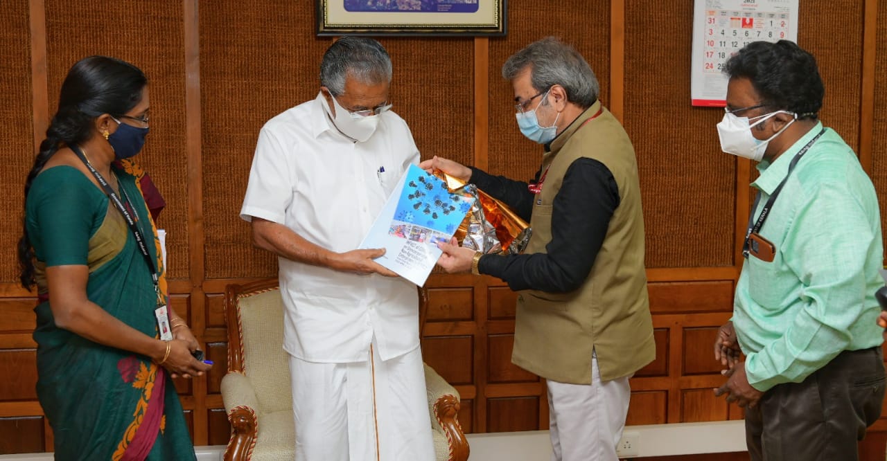 Hon. Chief Minister handing over a copy of report of ACS Planning