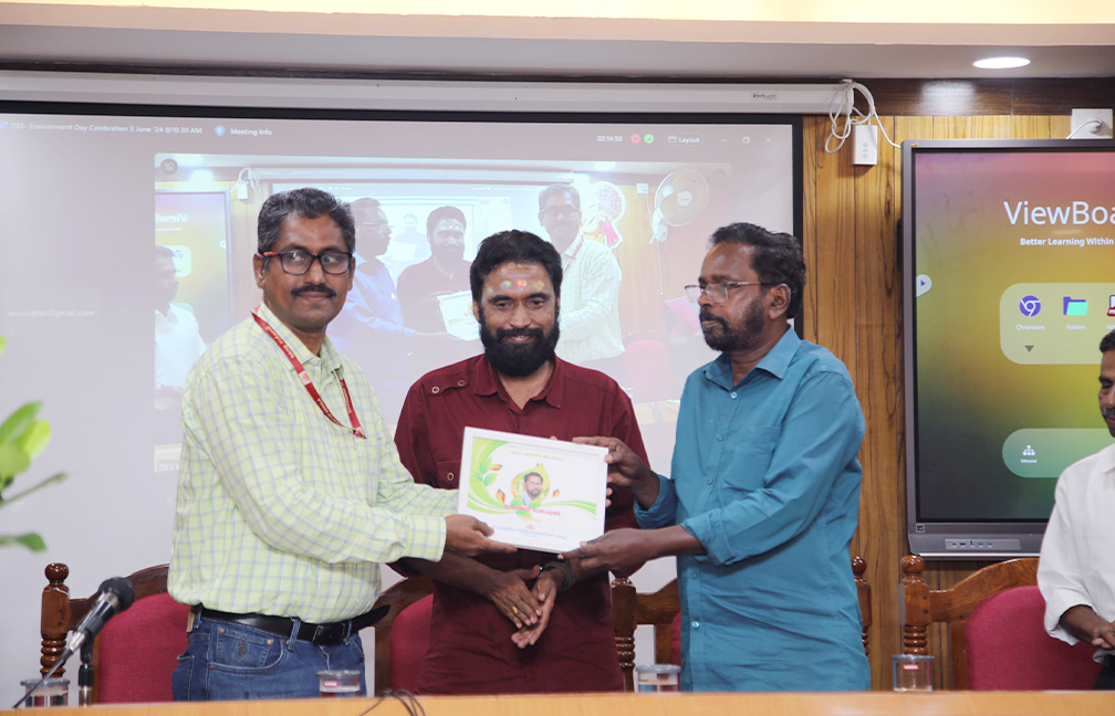 World Environment Day Celebration held at DES on 5 June 2024. Handing over a memento to social worker and lyricist Sri. Enchakkad Balachandran.