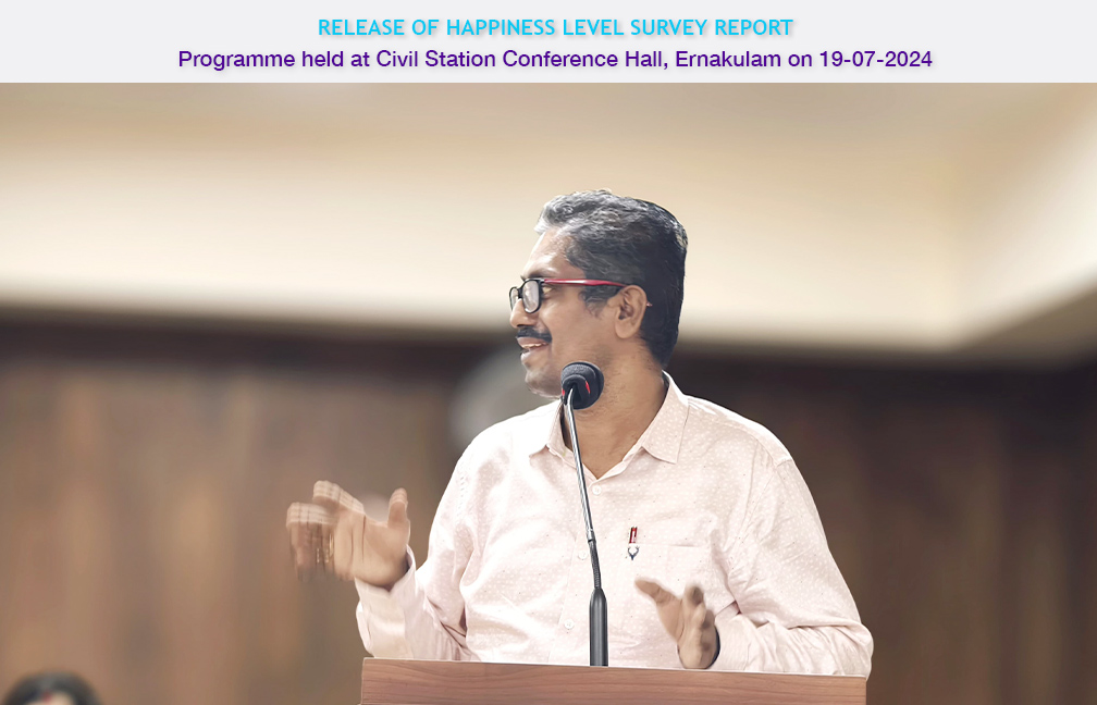 Release of Happiness Survey report held at Ernakulam on 19 July 2024. Director DES Sri. Sreekumar B addressing the gathering.