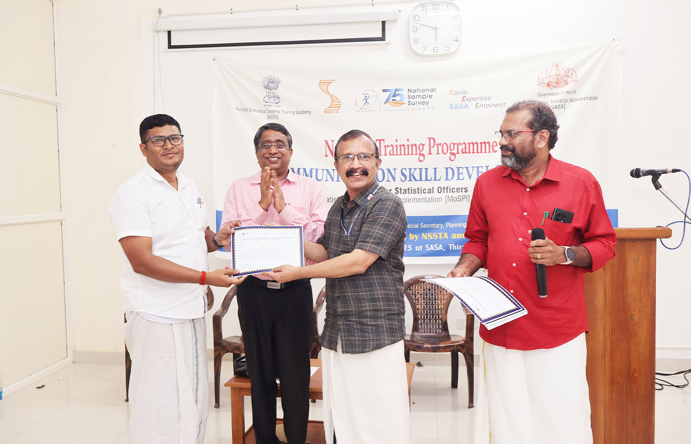 Presenting certificate to Sri. Sudip Bodhak, Senior Statistical Officer, NSO (FOD) SRO Midnapore, West Bengal