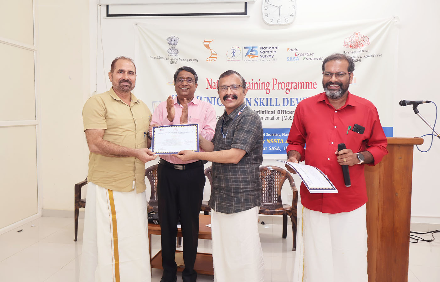Presenting certificate to Sri. Mahesh Kumar Sharma, Senior Statistical Officer, NSO (FOD) RO Jammu, J & K