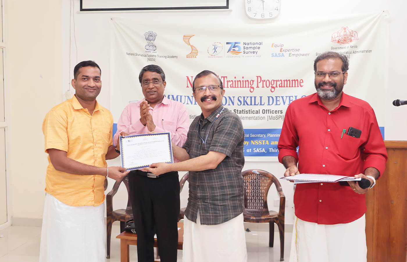 Presenting certificate to Sri. Kartick Karmakar, Senior Statistical Officer, NSO (FOD) SRO Chinsurah, West Bengal