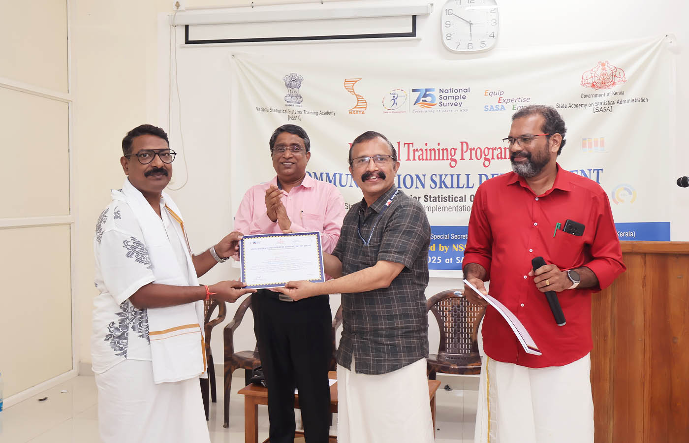 Presenting certificate to Sri. Tapan Kumar, Senior Statistical Officer, D/o Agriculture & Farmer Welfare, New Delhi