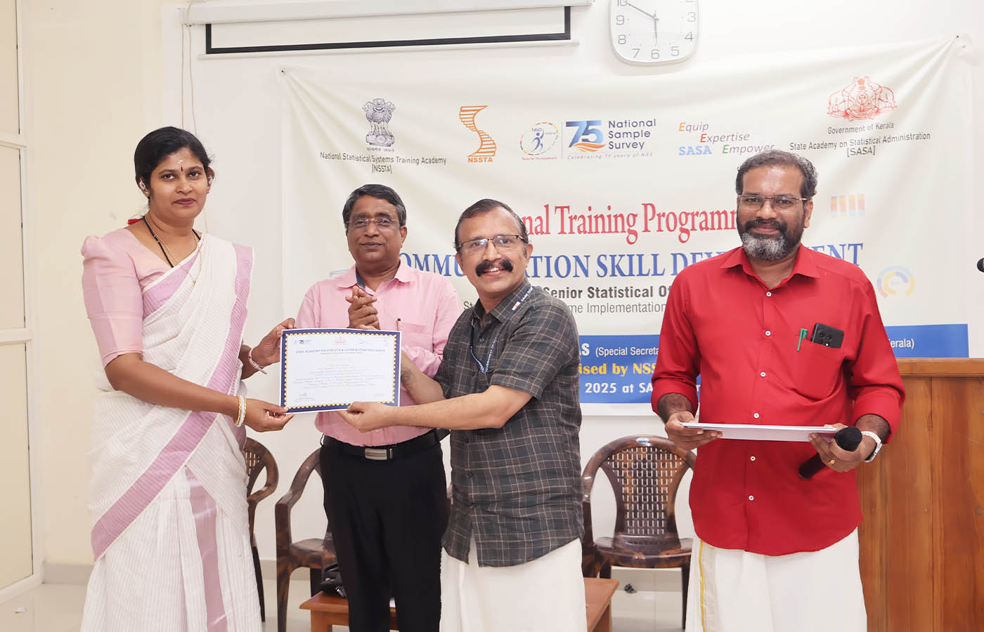 Presenting certificate to Smt. Divya K V, Senior Statistical Officer, NSO (FOD) SRO Kollam, Kerala